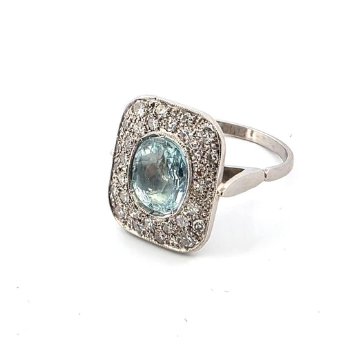 Bague 52 Bague en platine avec aigue-marine centrale et diamants environnants 58 Facettes