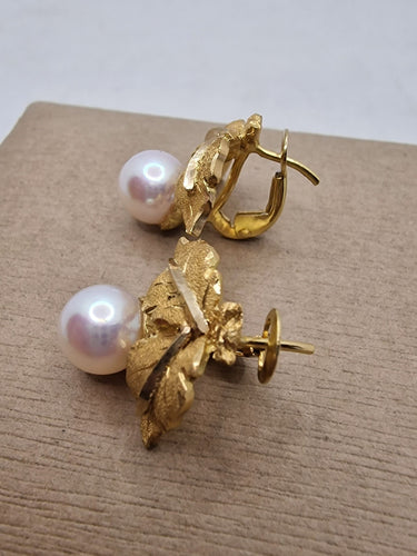 Boucles d'oreilles Boucles d'oreilles vintage en or jaune et perles en forme de feuille 58 Facettes