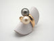 Bague 52 Bague or jaune, perle de Tahiti et perle blanche 58 Facettes