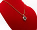 Pendentif Pendentif coeur or bicolore, saphirs, diamants 58 Facettes 250253