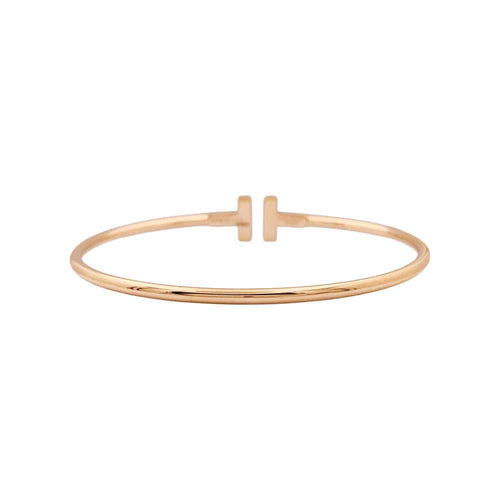 Bracelet Bracelet Tiffany "Wire Tiffany T" en or rose et diamants. 58 Facettes 34827