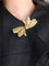 Broche Broche nœud papillon or jaune 58 Facettes 1210.2