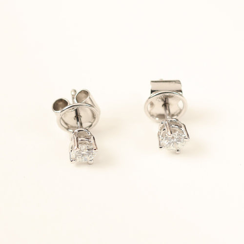 Boucles d'oreilles dormeuses en or blanc avec diamants taille brillant