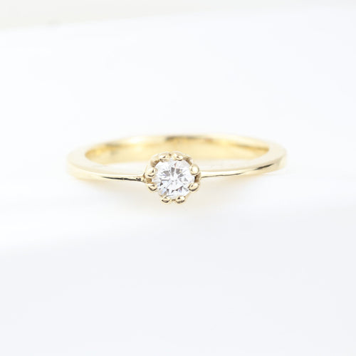 Bague Bague solitaire en or jaune avec diamant taille brillant 58 Facettes 130003