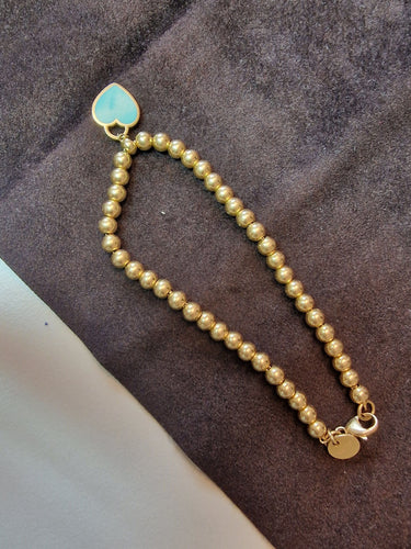 Bracelet Tiffany&Co - Bracelet de perles Heart Tag en or jaune 58 Facettes