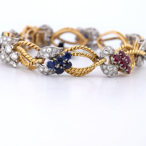 Bracelet Bracelet en or jaune orné de diamants et de pierres de couleur 58 Facettes