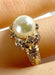 Bague 52 Bague or jaune, perle et 38 diamants 58 Facettes AB448