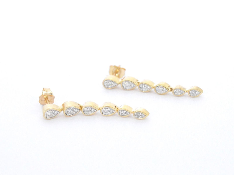 Boucles d'oreilles en or jaune avec diamants