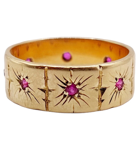 Bague 54 Large bague jonc Art Déco or rose, rubis sertis étoilés (circa 1950) 58 Facettes A05174