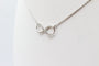 Collier Collier infini or blanc, diamants 58 Facettes 240410