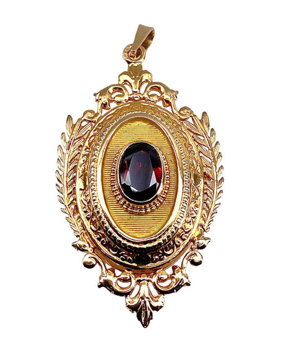 Pendentif Pendentif porte souvenir ouvrant en or et grenat 58 Facettes AB574