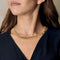 Collier Collier en or jaune à motif de feuilles 58 Facettes SQU3662