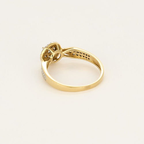 Bague en or jaune et or blanc à motif de fleur, diamants