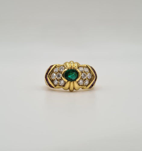 Bague 50 Bague or jaune sertie d’émeraude, diamants et rubis 58 Facettes