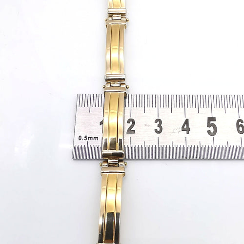 Bracelet Bracelet en or jaune et or blanc 58 Facettes