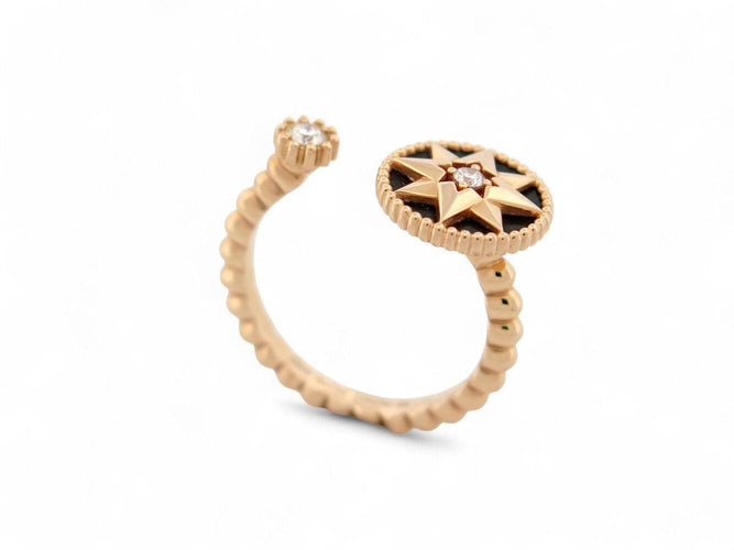 Bague 55 bague DIOR rose des vents t55 or jaune 18k diamants 0.10ct onyx 58 Facettes 271385