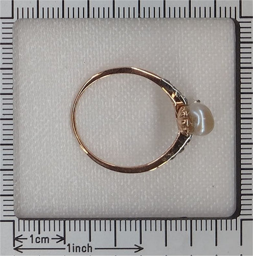 Bague 58 Charme historique : une bague de fiançailles en diamant et perle de 1895 58 Facettes 22327-0067