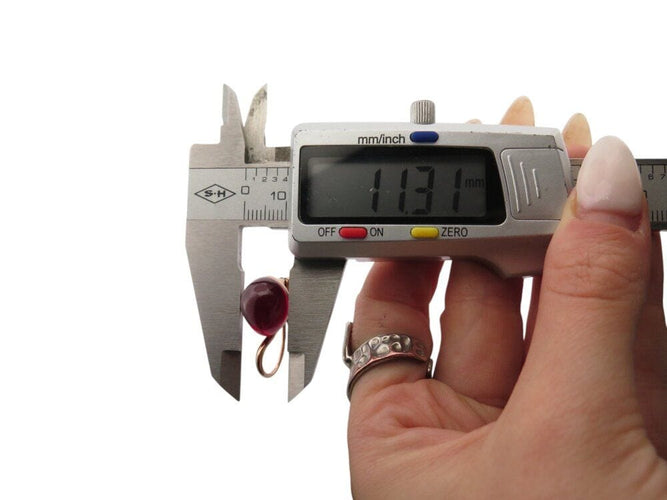 Boucles d'oreilles boucles d'oreilles POMELLATO dormeuses rouge passion rubis et or rose 58 Facettes 269158