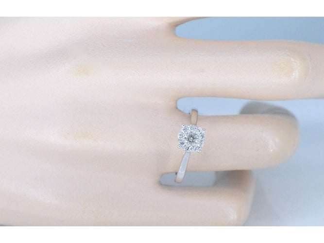 Bague entourage en or blanc avec diamants