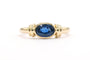 Bague 52 Bague contemporaine en or jaune sertie d'un saphir 58 Facettes 21648