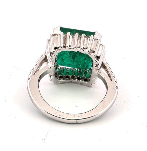 Bague 48 Bague en or blanc avec émeraudes et diamants 58 Facettes