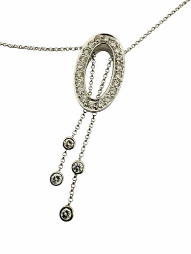 Parure collier et boucles d’oreilles or blanc et diamants