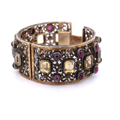 Bracelet Bracelet Buccellati vintage en or jaune 18 carats orné de béryls et de grenats 58 Facettes