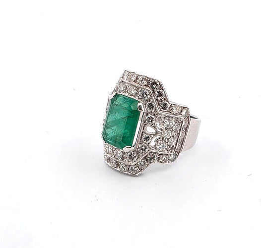 Bague 55 Bague en or blanc avec émeraude et diamants 58 Facettes