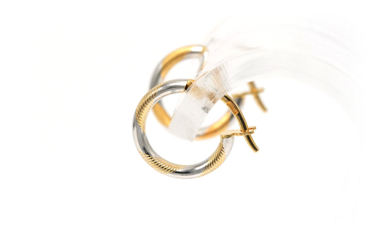 Boucles d'oreilles Boucles d'oreilles "créoles" contemporaines en or jaune et blanc 18 carats 58 Facettes B696