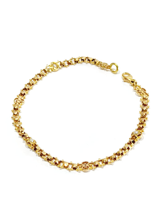 Bracelet en or rose et perles
