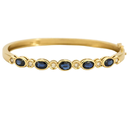 Bracelet Bracelet jonc en or jaune, diamants et saphirs 58 Facettes GAP1474