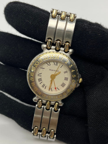 Montre Pequignet Moorea GMT Paul Loup Sulitzer 58 Facettes