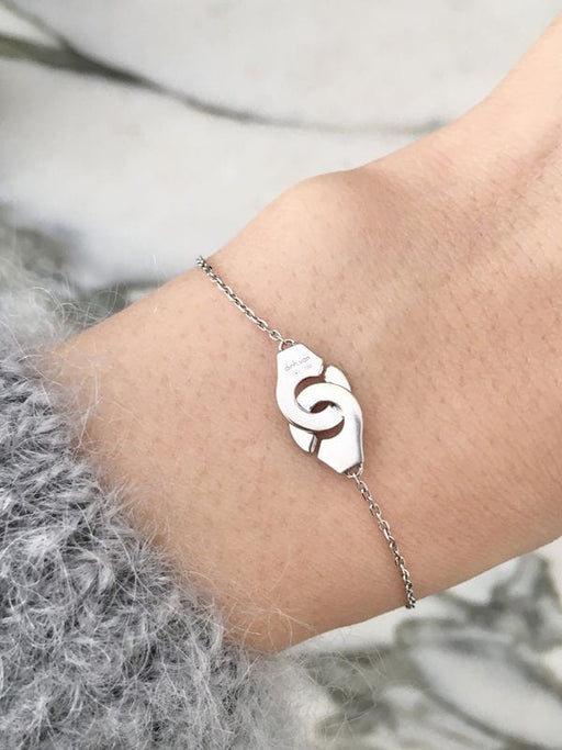 DINH VAN - Bracelet menottes en or blanc 58 Facettes