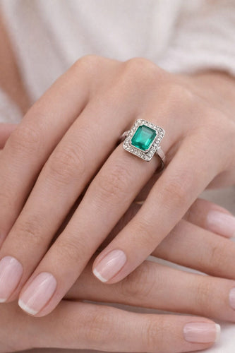 Bague 54 Bague Art Déco en or blanc avec diamants et émeraudes 58 Facettes 50368