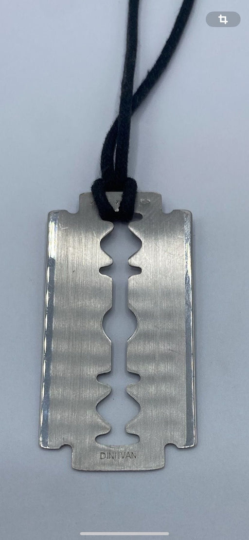 Dinh Van pendant - GM “Razor blade” pendant on cord 58 Facettes 096424105792