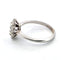 Bague 54 Bague en or blanc avec un diamant ovale au centre et des diamants brillants tout autour. 58 Facettes