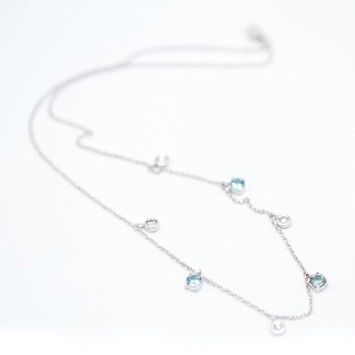 Collier BELL en or blanc et topaze bleue