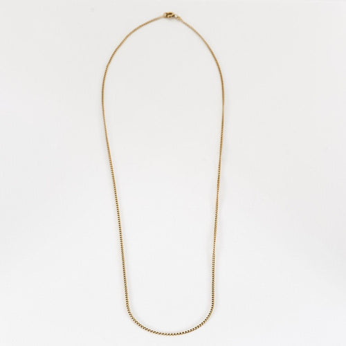 Collier Chaîne en or jaune 18K à petite maille forçat 58 Facettes CHA5342-1