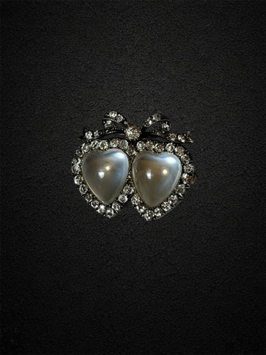 Broche Broche « L’Élégance de l’Amour » en or, diamants et pierres de lune 58 Facettes