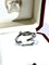 Bague 56 Cartier - Bague or blanc "Entrelacés" 58 Facettes