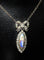 Collier Pendentif et sa chaine en argent : enfant sur email et pierres blanches. Vers 1900 58 Facettes AB386