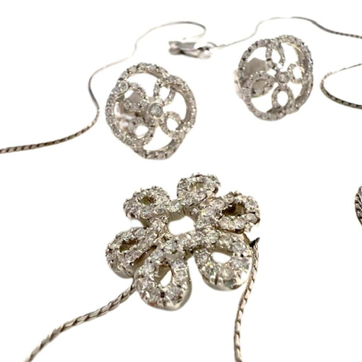 Collier Boucles d'oreilles et collier contemporains en or sertis de diamants 58 Facettes Q54B