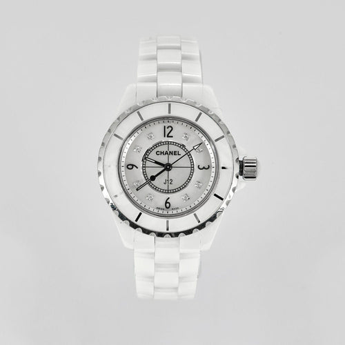 Montre CHANEL- J12 - Montre en céramique blanche. 58 Facettes 250278