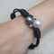Bracelet Bracelet en cuir, perles et diamants 58 Facettes P113