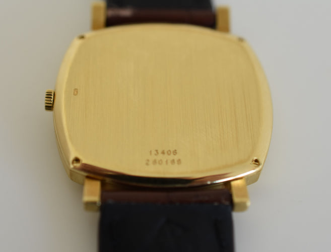 Montre PIAGET - Montre "Coussin" automatique, réf. 13406, or jaune, vers 1978 58 Facettes PIA-100