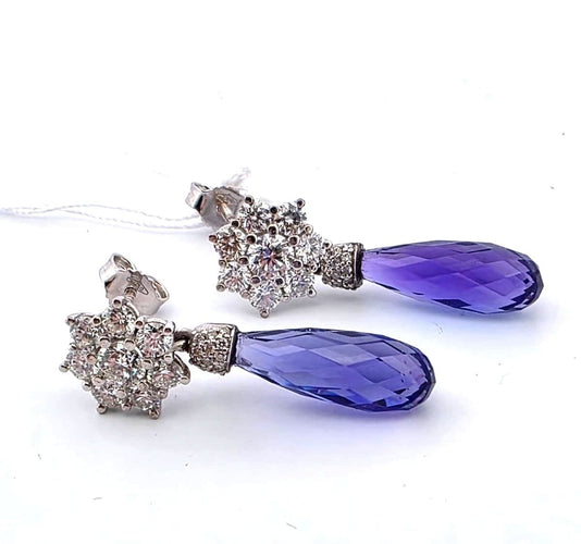 Boucles d'oreilles Boucles d'oreilles en or blanc serties de diamants et de tanzanite 58 Facettes