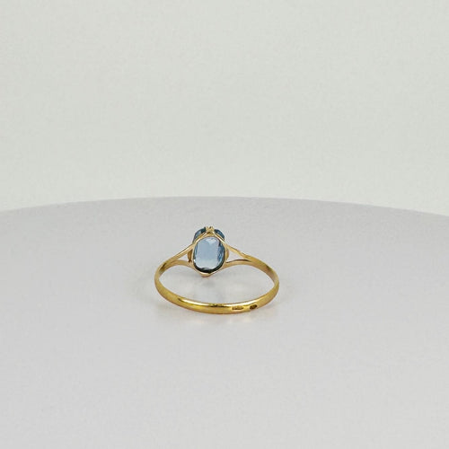 Bague Bague en or jaune avec topaze bleue ovale 58 Facettes 2508021