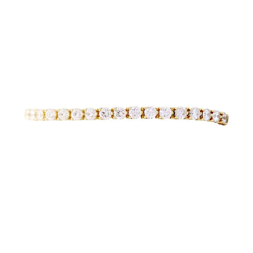 Bracelet ligne Cartier, or jaune et diamants.