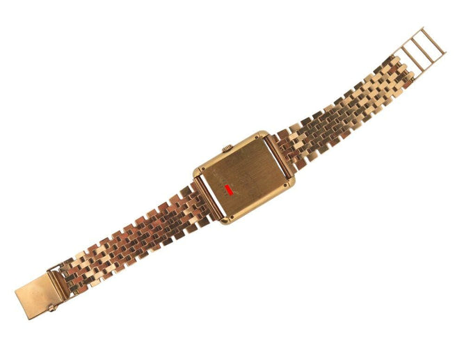 Montre vintage montre baume & mercier tank 37077 mecanique or 18k & oeil de tigre 58 Facettes 268283