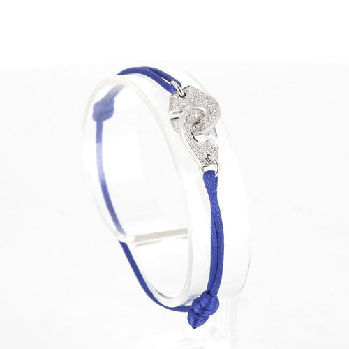 Bracelet Menottes R12 en or blanc et diamants 58 Facettes 341112